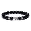 Bracelet éléphant et perles d'onyx brillantes
