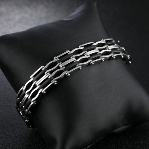 Bracelet en acier inoxydable argent et noir avec maillons plats et ondulés