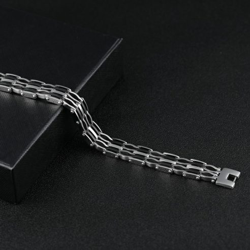 Bracelet en acier inoxydable argent et noir avec maillons plats et ondulés