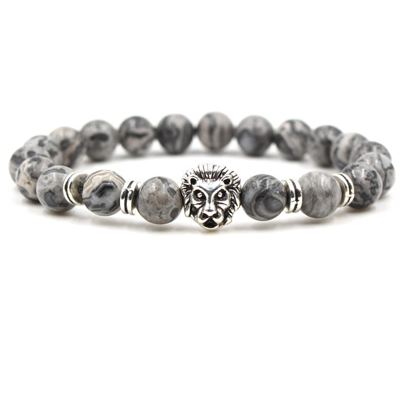 Bracelet pour homme en perle de jaspe composé d'une élégante tête de lion et de quatre disque couleur argent.