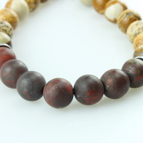Bracelet pour homme composé de perles de jaspe scénique et de pierres rutile naturelles.