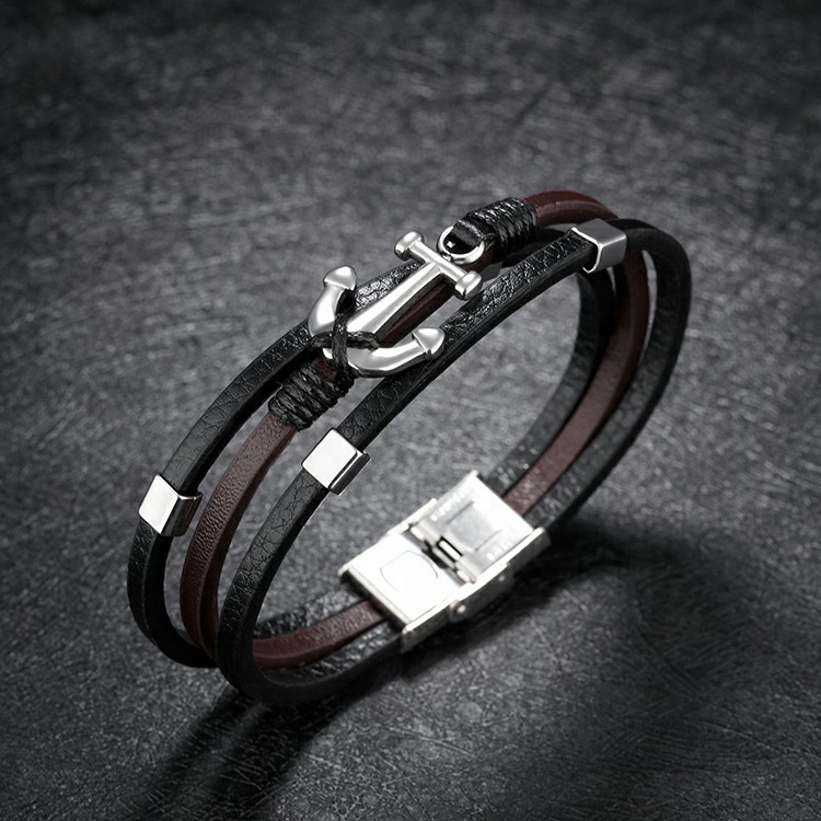 Bracelet pour homme en cuir lisse noir et marron avec ancre en acier inoxydable.