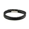 Bracelet pour homme composé d'une lanière de cuir tressé noir et de pierres d'onyx.